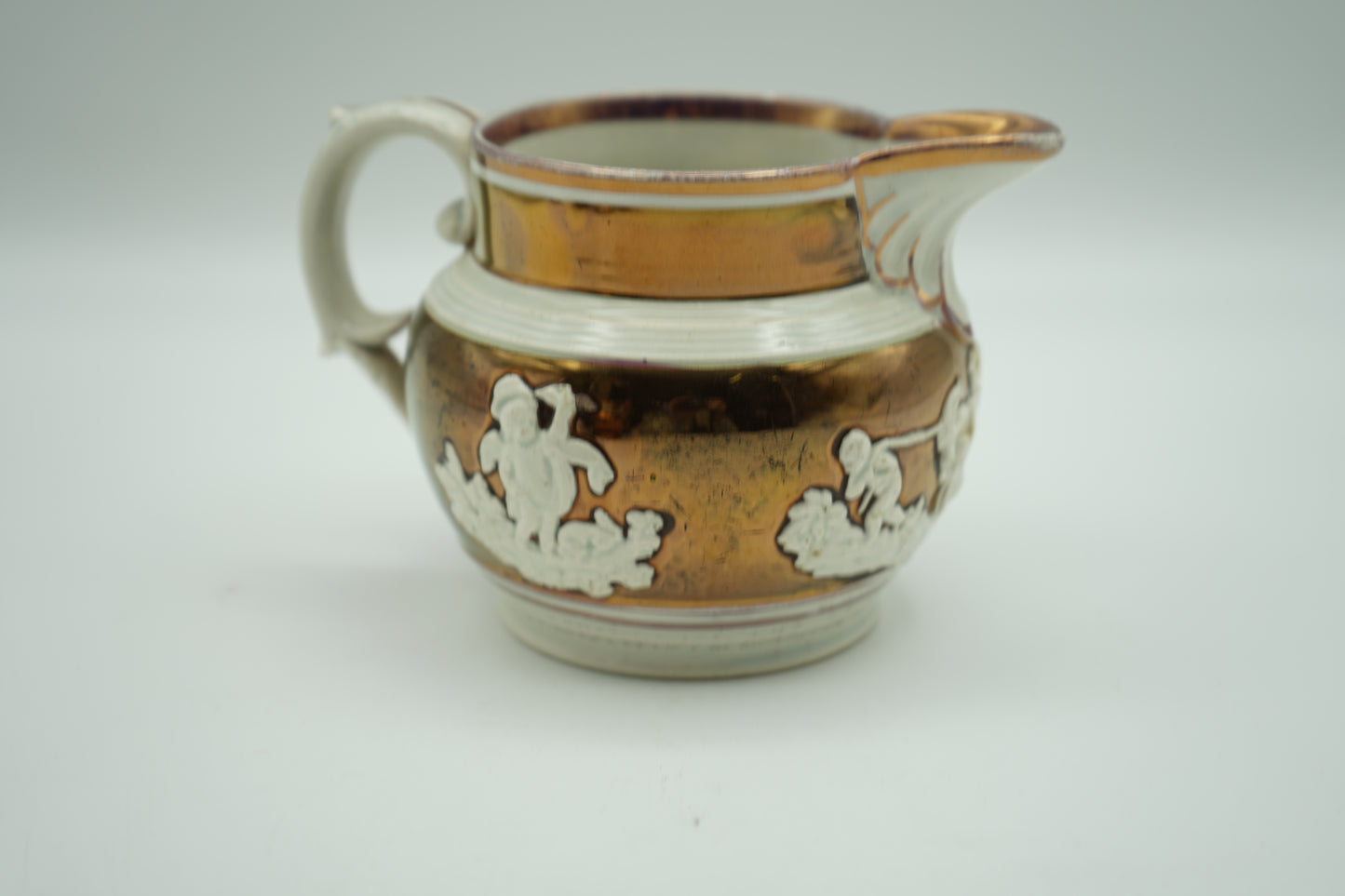 19th century copper lusterware pitcher with sprigged classical figures