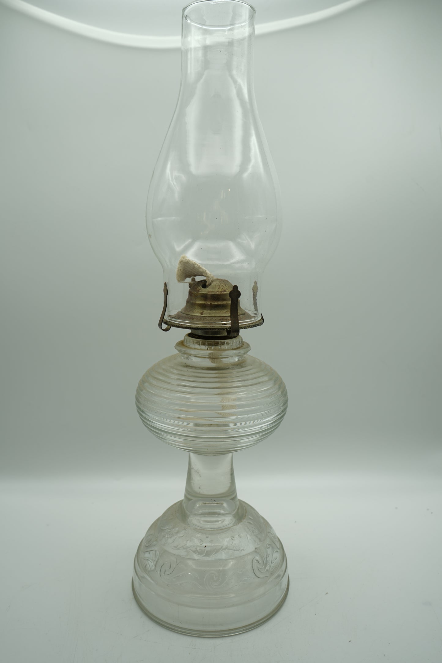 Antique Clear Hurricane Lamp with Beehive and Scroll Base